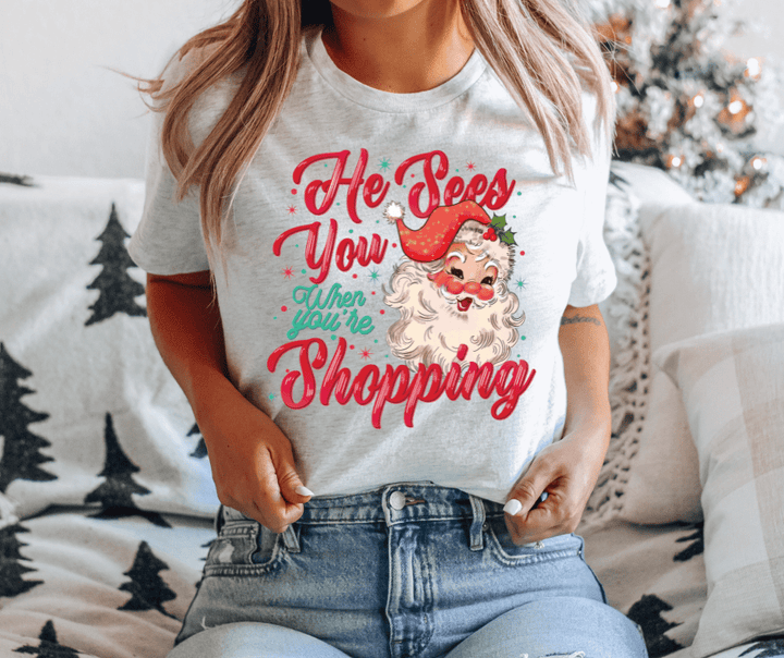 He Sees You When You're Shopping Ash Tee or Sweatshirt - Wholesale - The Red Rival