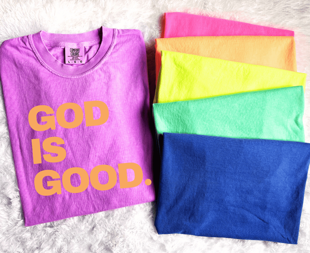 Orange God Is Good on Purple Tee - Graphic Tee - The Red Rival