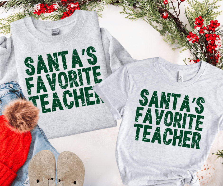 Santa's Favorite Teacher Green Letters Ash Tee or Sweatshirt - Tees - The Red Rival