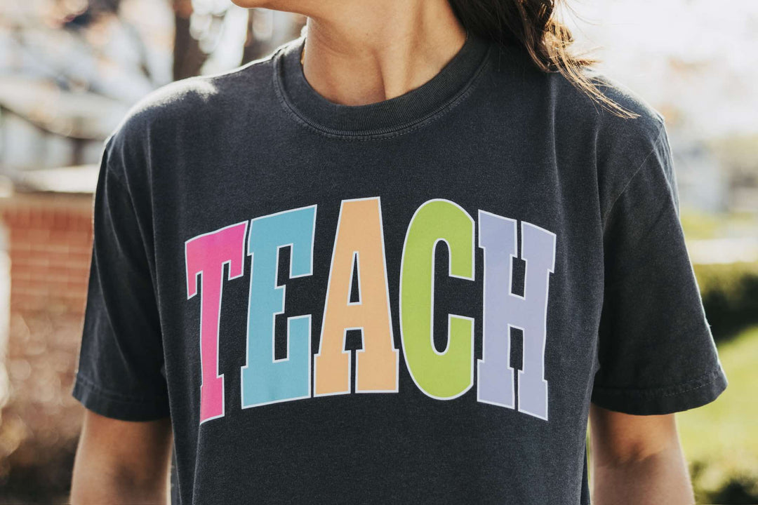 TEACH - Multi - Color Varsity Letters (Pick your tee color) - Graphic Tee - The Red Rival