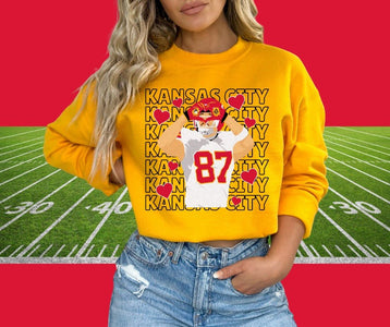 Kansas City Repeat Travis Kelce Heart Hands Gold Graphic Sweatshirt - Graphic Tee - The Red Rival